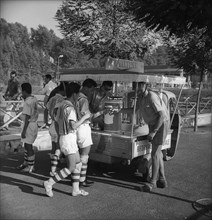 Rome 1960: Athletes at Ovomaltine stand.