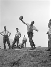 Soldiers doing Stone Throwing .