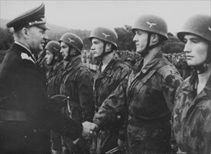 WW 2 Italy: General Student give the soldiers of the parachute troops the Iron Cross.