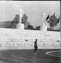 Rome 1960: unknown athlete in the olympic stadium.