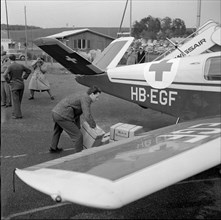 Swiss sports pilot with medicaments for Hungary, Kloten around 1956.