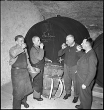 Villager drinking New Year's Eve wine in Zofingen, 1941 .