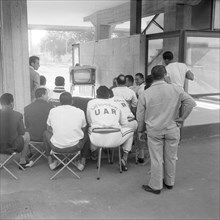 Rome 1960: athletes watching opening ceremony on TV.