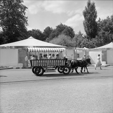 SAFFA fair 1958: children driving in a coach.