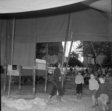 Circus Pilatus, Zurich 1957: Children watching the erecting of the tent.