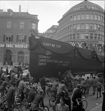 Nosy people watching ship transport through Zurich 1938