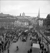 Nosy people watching ship transport through Zurich 1938