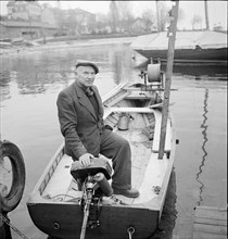 Professional fisherman René Vallelian, Serrieres 1949.