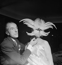 Beautician Fernand Aubry with model, ca. 1955 .