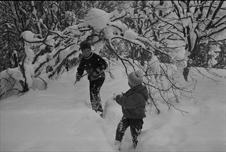 Cécile Aubry with her son Mehdi in Gstaad 1962.