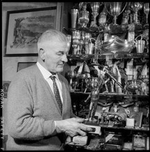 Charles Courant, former wrestler, at home in Montreux 1957.