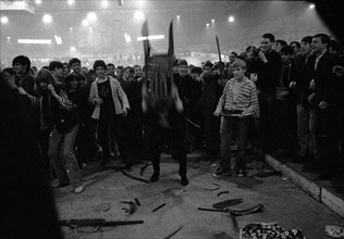 Fans smash chairs at Rolling Stones concert at Hallenstadion, Zurich 1967.