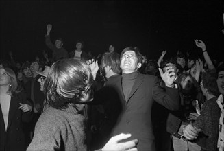 Cheering fans at Rolling Stones concert at Hallenstadion, Zurich 1967 .