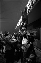 Fans climb on stage at Rolling Stones concert at Hallenstadion, Zurich 1967 .