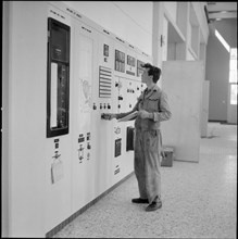 Technician in the monitoring center of power station in Liddes, 1959