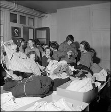 Basel girl scouts sorting clothing for Hungary 1956