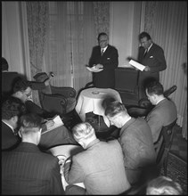 Professor Pirenne (l) reads statetment from Leopold of Belgium, Geneva 1950