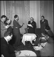 Professor Pirenne (l) reads statetment from Leopold of Belgium, Geneva 1950