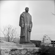 Statue of a monk Le Defricheur at Boudry Castle, 1960