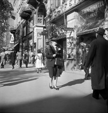 People passing by in Zurich, 1950