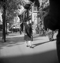 People passing by in Zurich, 1950