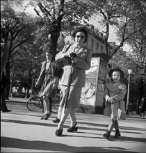 People passing by in Zurich, 1950