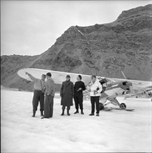 Ambassador Henry J. Taylor and Hermann Geiger, glacier pilot 1957