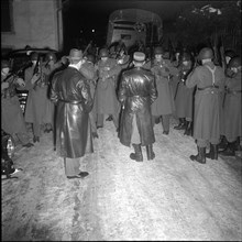 Romanian embassy Berne occupied by four armed Romanians, Swiss soldiers, 1955