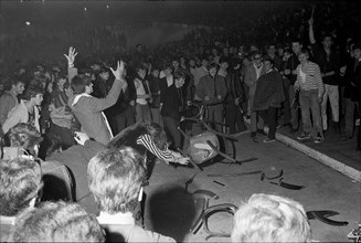 Fans smash chairs at Rolling Stones concert at Hallenstadion, Zurich 1967