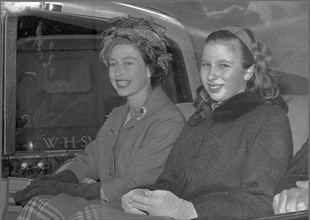 Queen Elizabeth returns home from trip to New Zealand and is being picked up at the airport by