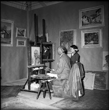 Painter Angelo Giorgetti and model, ca. 1950