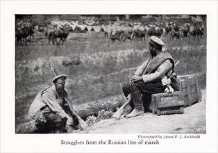 This photo dates to World War I. The caption reads: Stragglers from the Russian line of march.