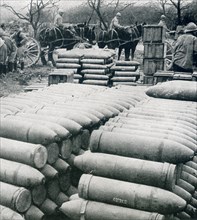 This photo, taken during World War I, hsows shells for Verdun in France. The captions says: Big