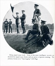 This photo taken in Europe in World War I has as its caption: Doing signal corps work. Some of the