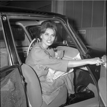 Sophia Loren in car in Zurich-Kloten 1959.