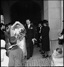 Soldiers' wedding; bridal couple leaving the church; 1943.