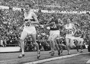 Olympic Games Helsinki 1952, 5'000m: Emil Zatopek (903) wins.