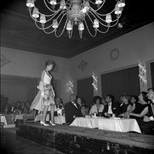 fashion show in the Palace hotel, St. Moritz, model on catwalk, 1962.