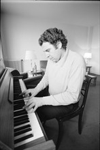 Mikis Theodorakis playing the piano, ca. 1968.