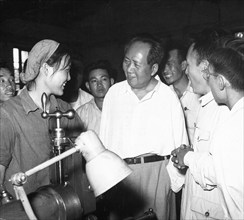 Mao Tse-tung at the machinery plant of the Tientsin University 1958.