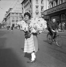 Young woman with flowers in Zurich 1961.