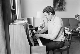 Mikis Theodorakis playing the piano, ca. 1968.