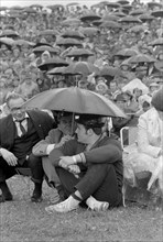 Swiss wrestling festival Biel 1969: Hunsperger under an umbrella.