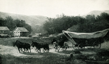 Shown here is an early mode of transportation in the United States - the Conestoga Wagon. The