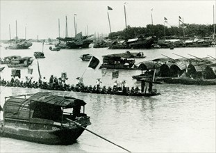 Dragon Boat- The caption for this 1900 photo reads: This boat is very long and very narrow It is