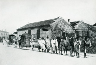 Wedding Procession in China. The caption of this 1900 photo reads:  “Wedding Procession.  Bride in