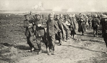 This photo shows Private Peat who fought in World War I. The caption reads: “Prisoners going to