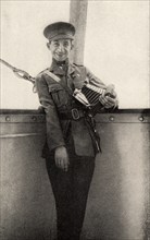 This photo shows Private Peat who fought in World War I. The caption reads: Still smiling though