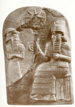 The sculpted figure at left is Hammurabi, standing before Shamash, the sun god and 'Lord of