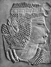 This carved relief shows the head of Amenhotep III with the royal crown and rearing cobra. It was